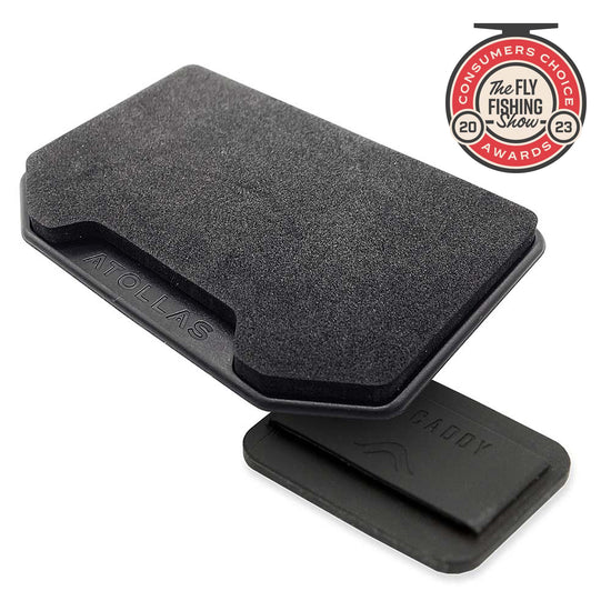 Atollas Fly Caddy XL fly patch hovering over an included docking station it clips into against white background