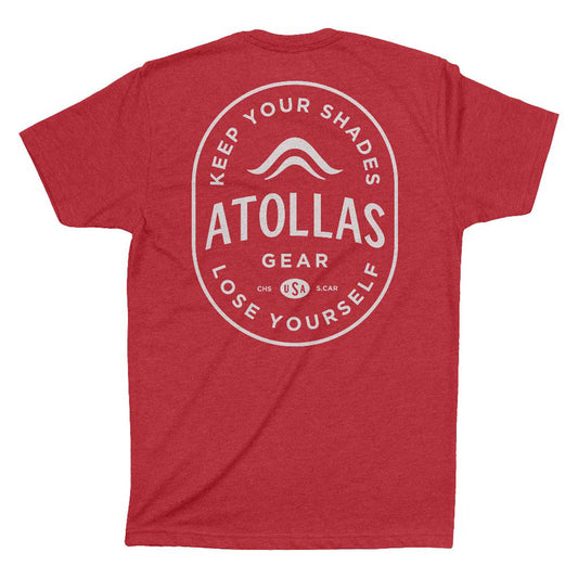 Red t-shirt with white 'Atollas' logo and text on a white background