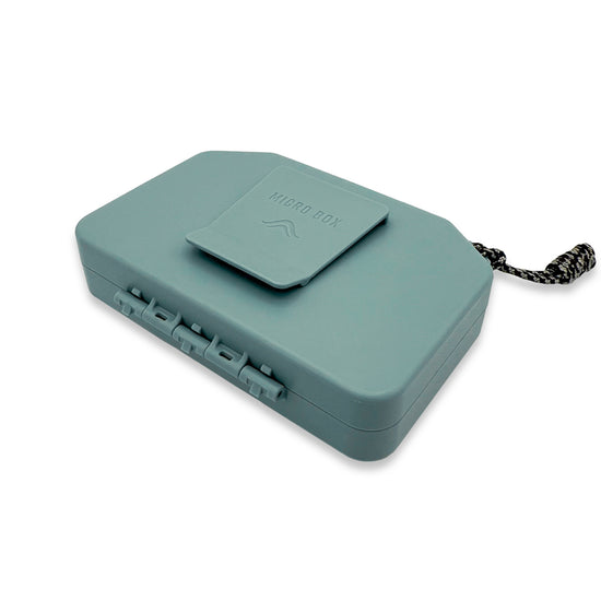 Atollas Micro Fly Box backside showing clipping mechanism on a white background