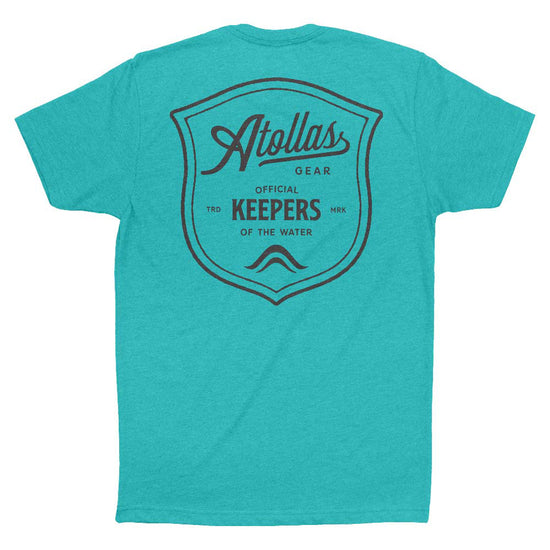 Teal t-shirt with black Atollas logo and text on a white background